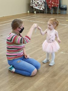 mother and little girl practicing ballet